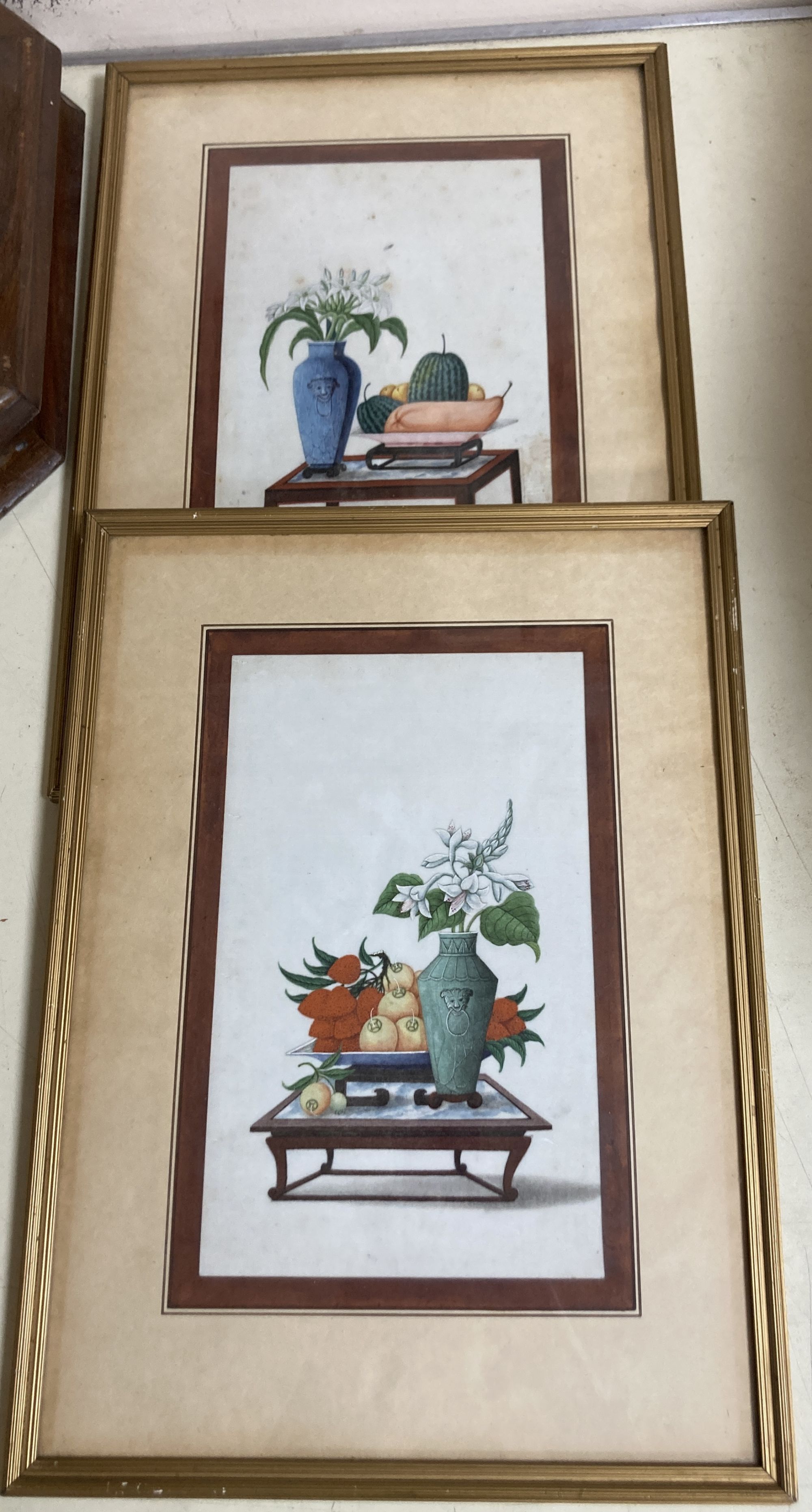 19th century Chinese School, pair of gouache on pith paper, Still lifes of fruit and flower vases on tables, 26 x 17cm